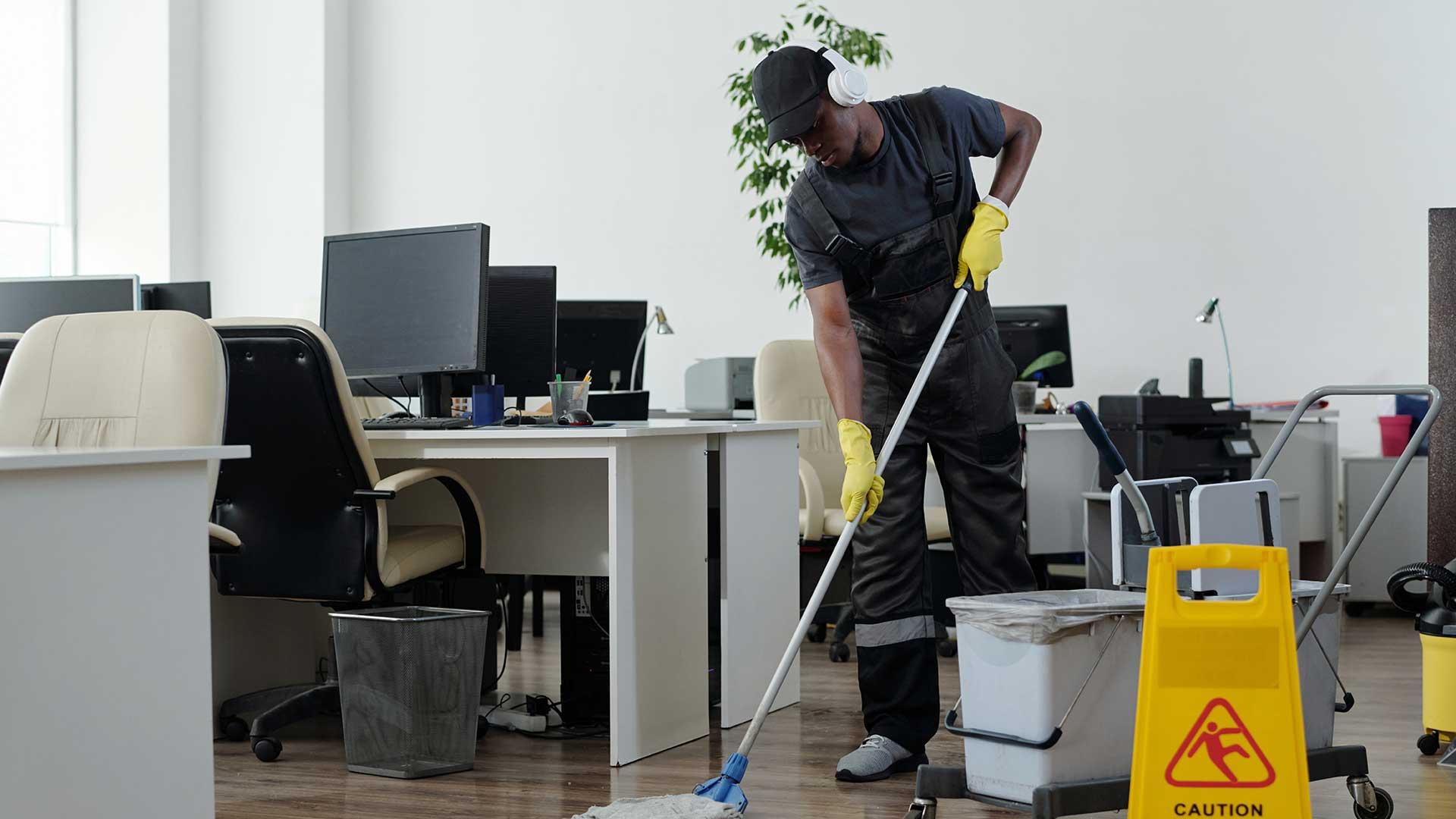 A modern, clean office building exterior, representing professional facilities management.